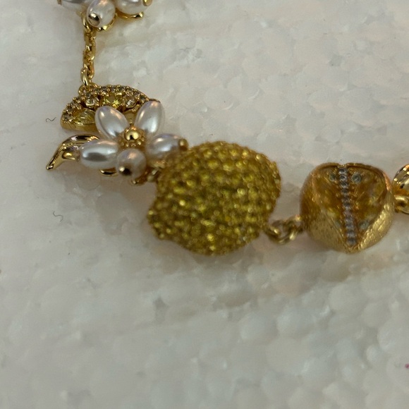 Kate Spade Gold Charm Bracelet with Whimsical Details - Picture 5 of 7